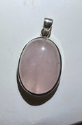 Simplistic Oval Rose Quartz Pendant in Sterling Silver