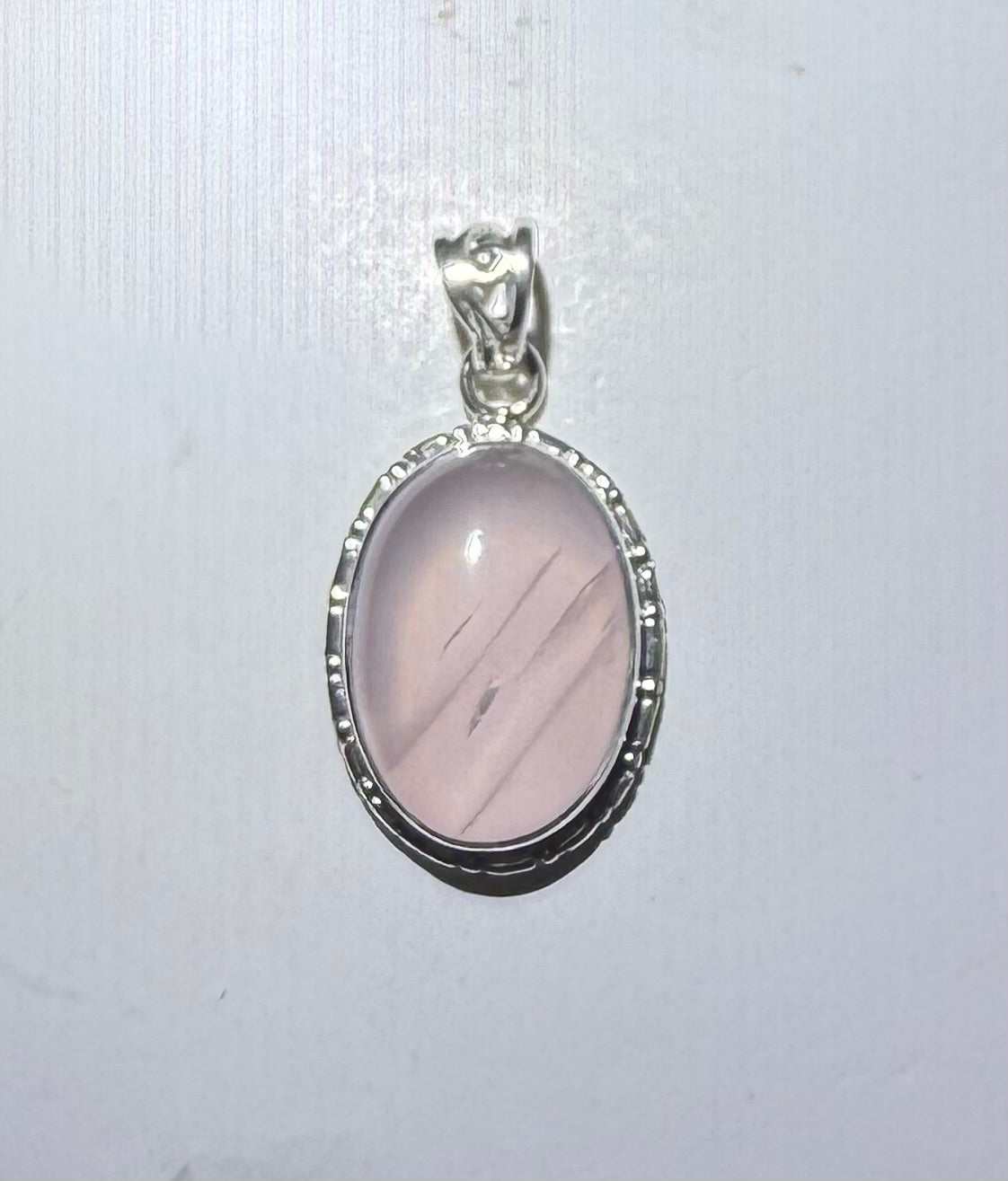 Oval Rose Quartz Pendant with Scalloped Border in Sterling Silver